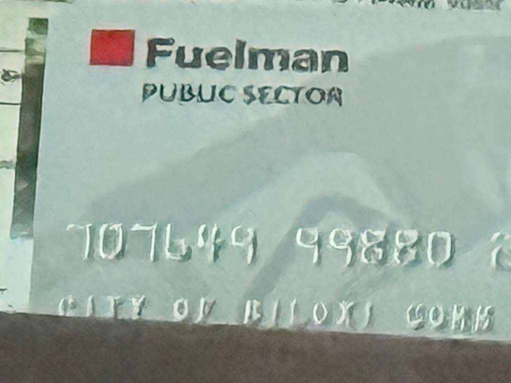 Fuelman PUBLIC SECTOR fuel card reading CITY OF BILOXI COMM — taxpayer-funded gas card for Community Development.